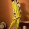 Yellow embroidered tunic, has three quarter sleeves, slip-on closure and regular waist hem