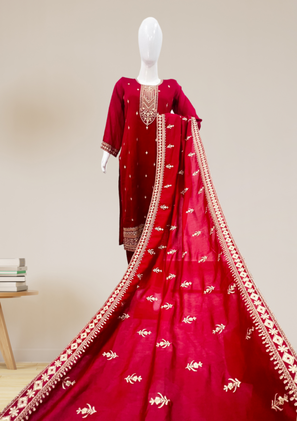 "Elegant red Chanderi silk suit featuring intricate gota phool embroidery."